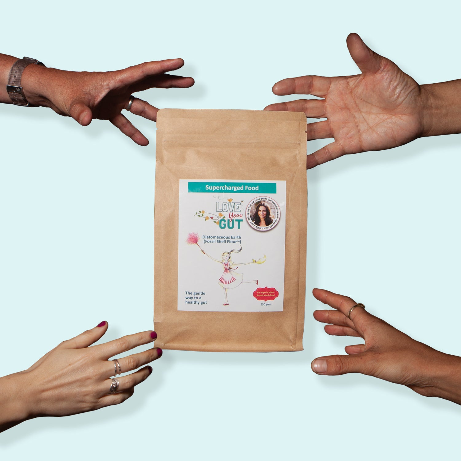  Hands reaching out to grab Love Your Gut Powder now