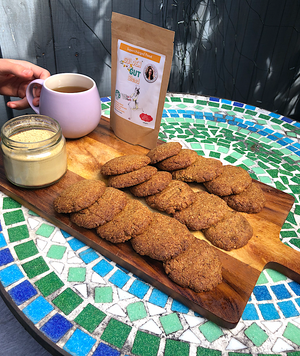 A table displaying a tray of cookies, featuring the Golden Gut Digestive Cookie.