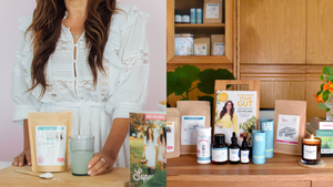  woman stands before a table filled with a diverse range of Supercharge Your Gut products