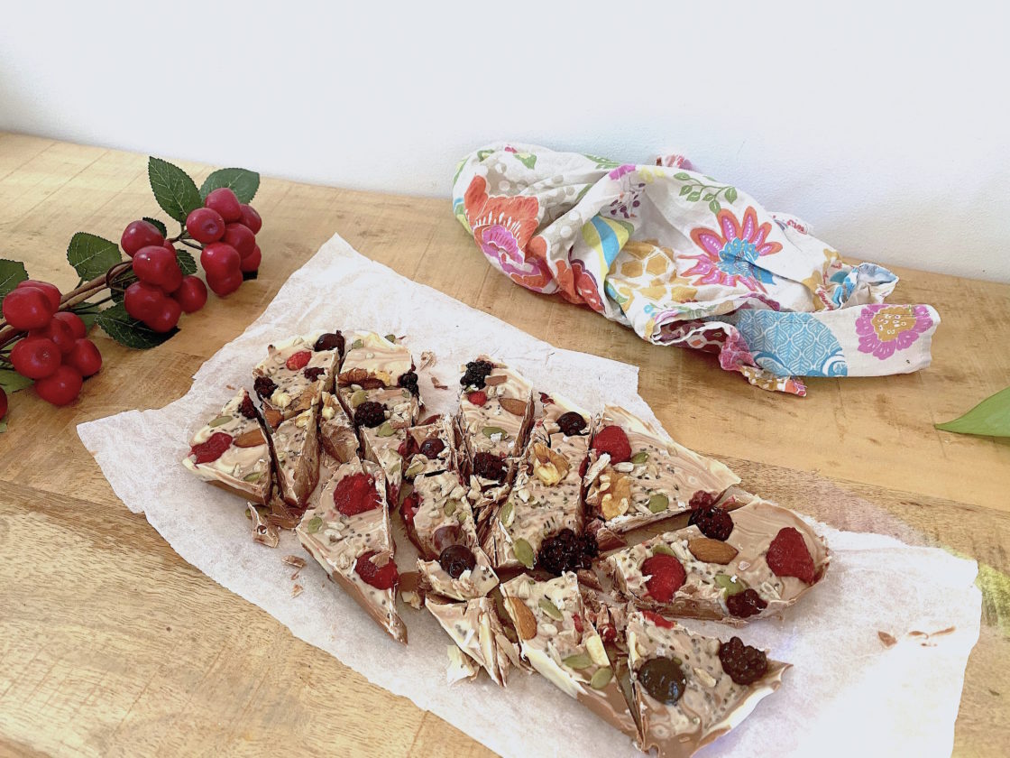 Fresh fruit and nuts on paper, nutritious and delicious