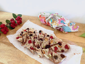 Fresh fruit and nuts on paper, nutritious and delicious