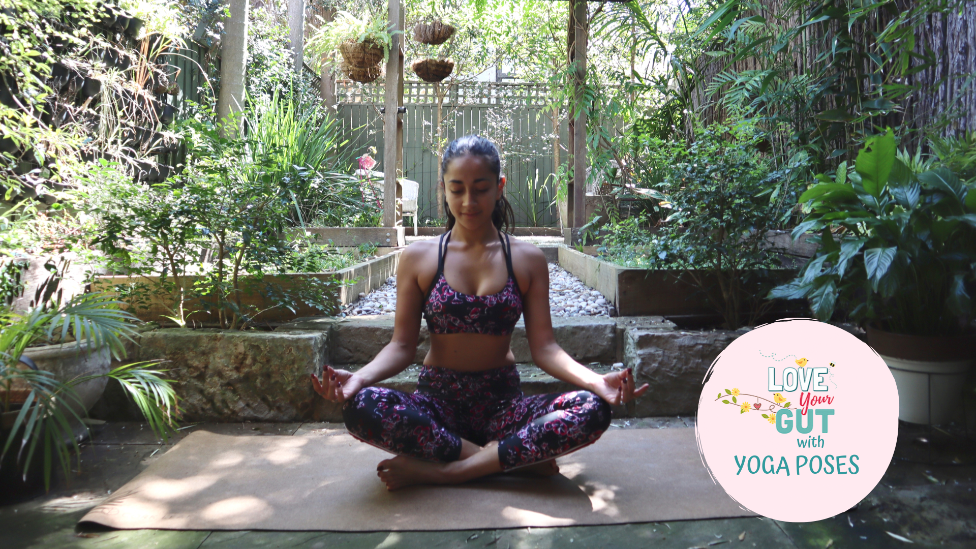 Woman practicing yoga in garden