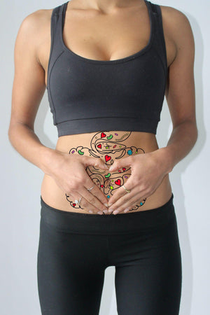A woman receiving a gut massage.
