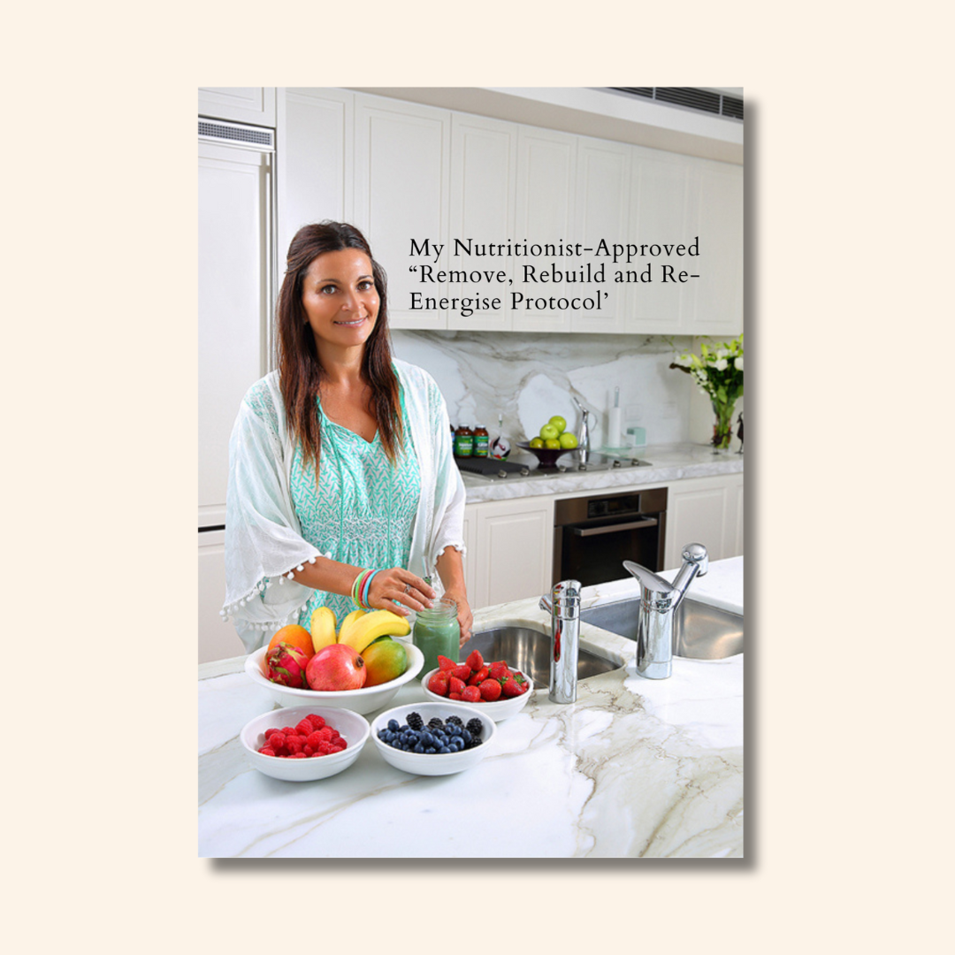 Lee Holmes in a kitchen with fresh fruit presenting the Remove Rebuild and Re-energise Protocol